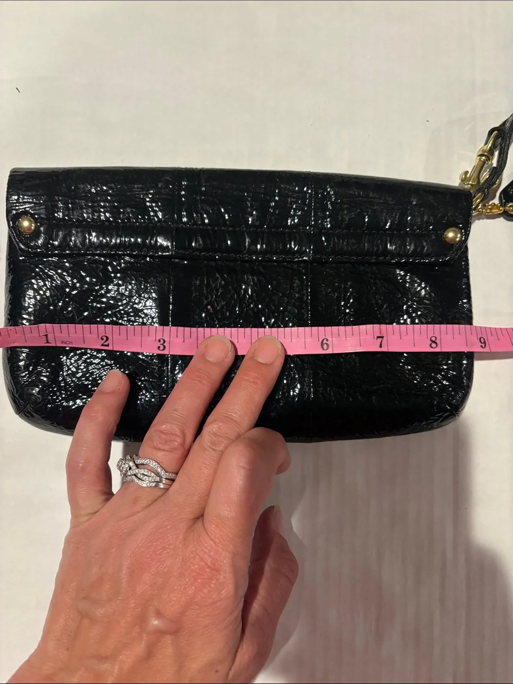 Coach Kristen Black Patent Leather Wristlet Phone Pouch with Gold Hardware